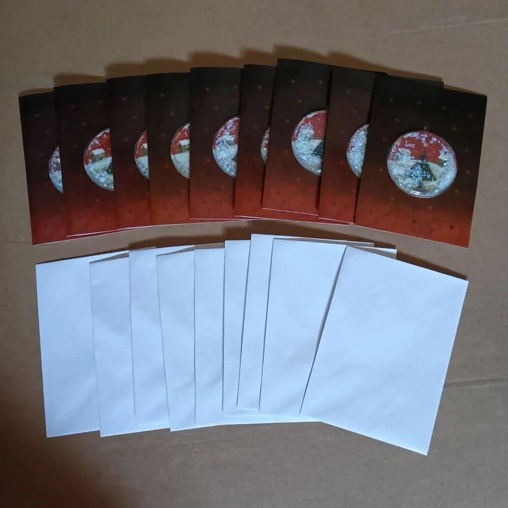 9 handmade Christmas cards with envelopes in box